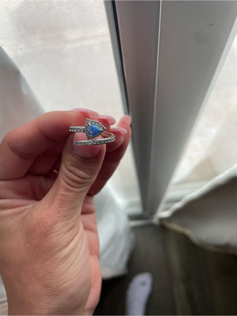 The Arrow of Love - lab grown blue fire opal ring with rhodium plating.